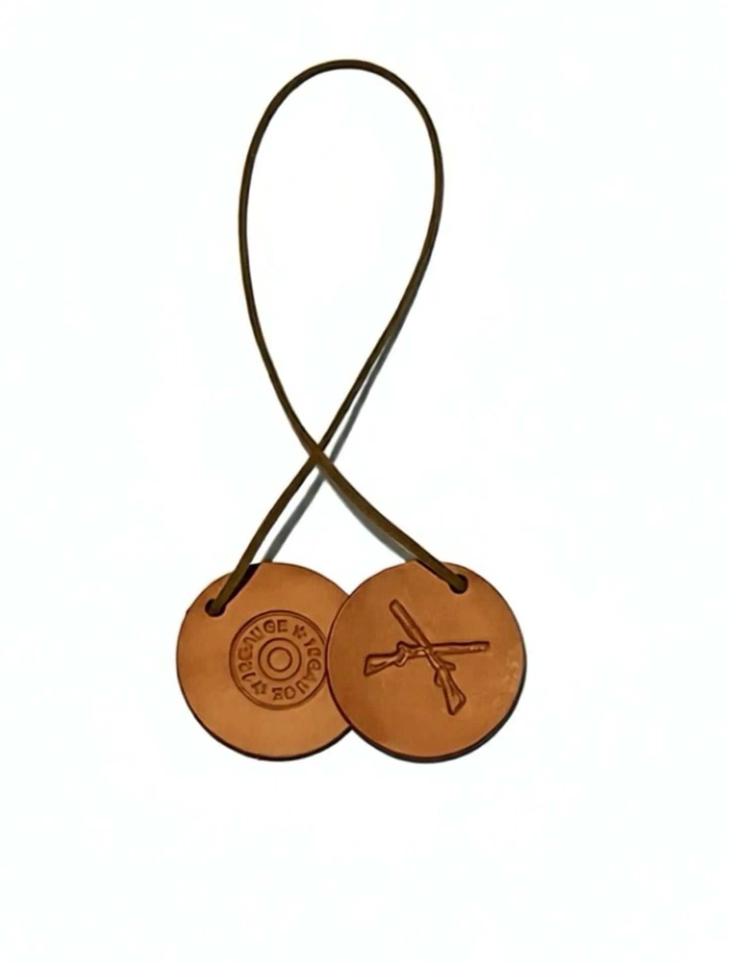 Two brown leather tags with a logo and text on a white background